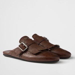 Prada Shuffle Fringed Leather Buckle Mules